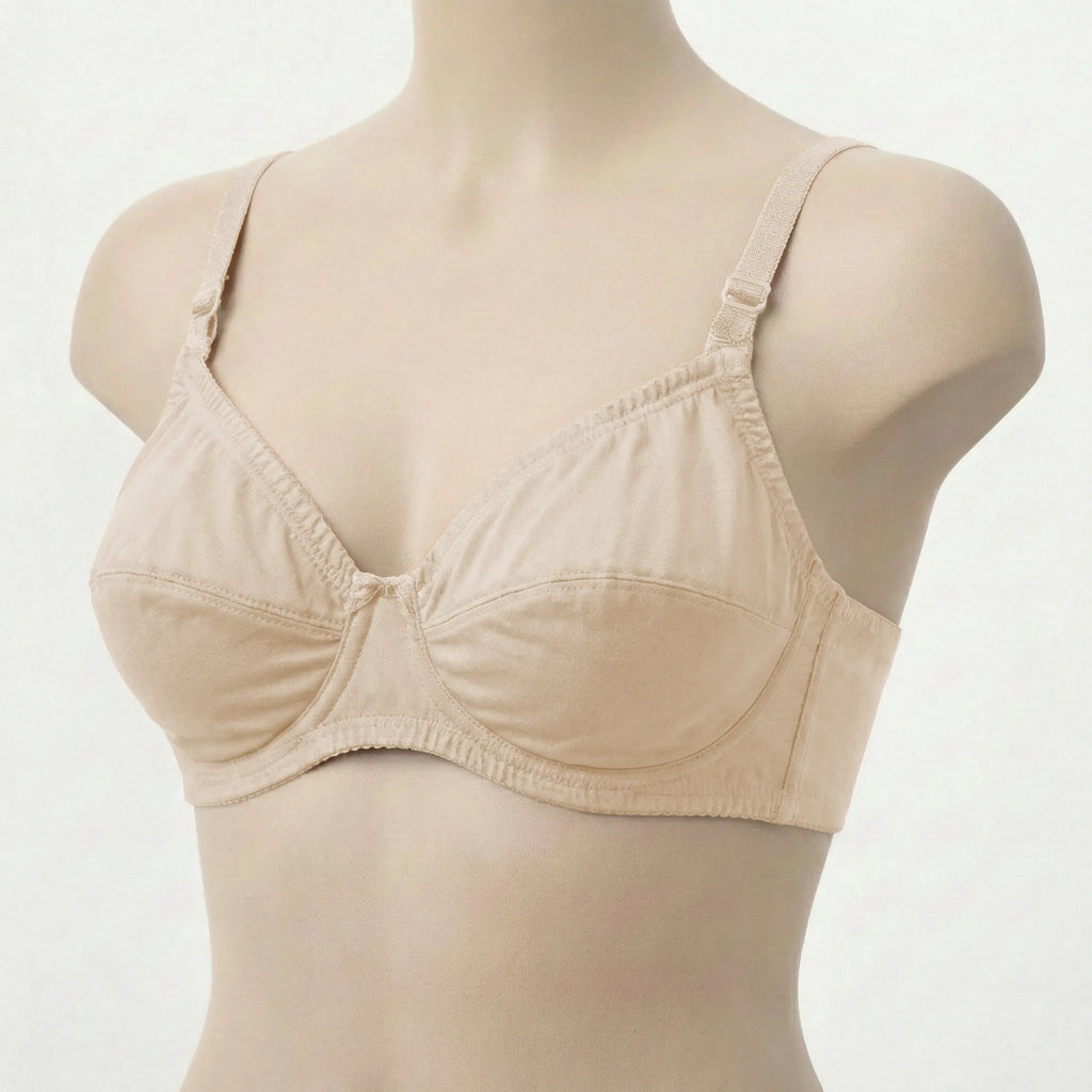 Beige bra on a mannequin against a white background