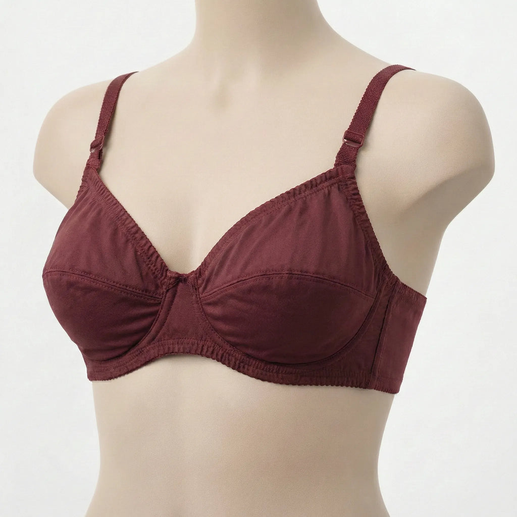 Maroon bra on a mannequin against a white background