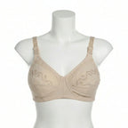 Beige bra on a mannequin against a white background