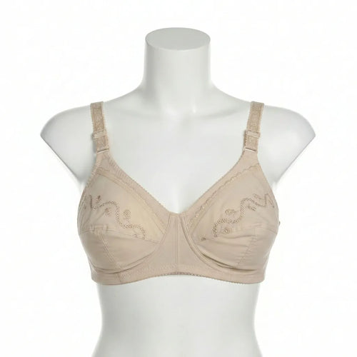 Beige bra on a mannequin against a white background